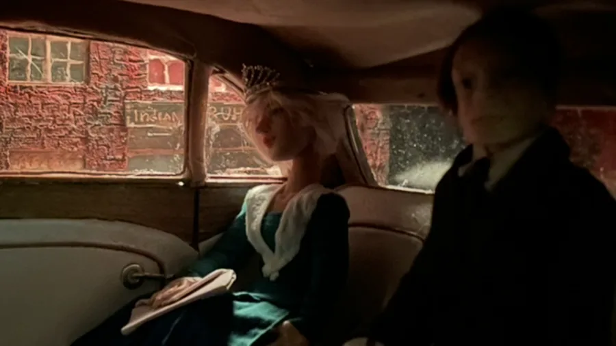 A character inside the miniature car