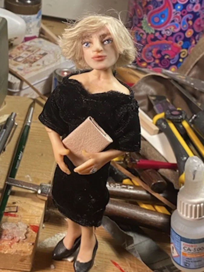 Puppet in a black outfit